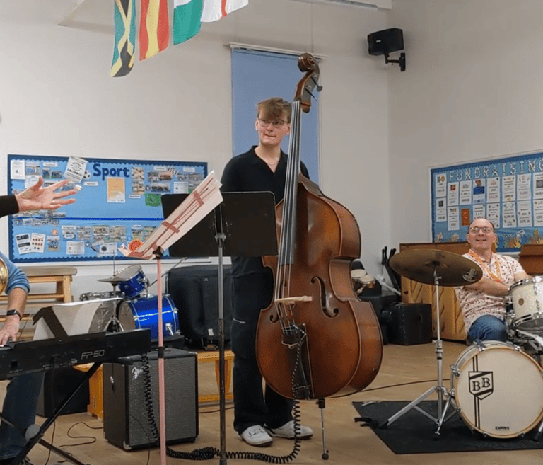 An image of Jamie Walker performing with a jazz quartet