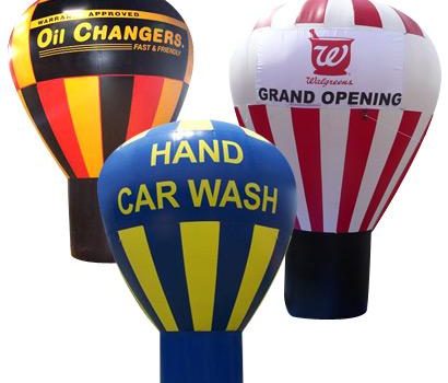 three inflatable decorations for businesses