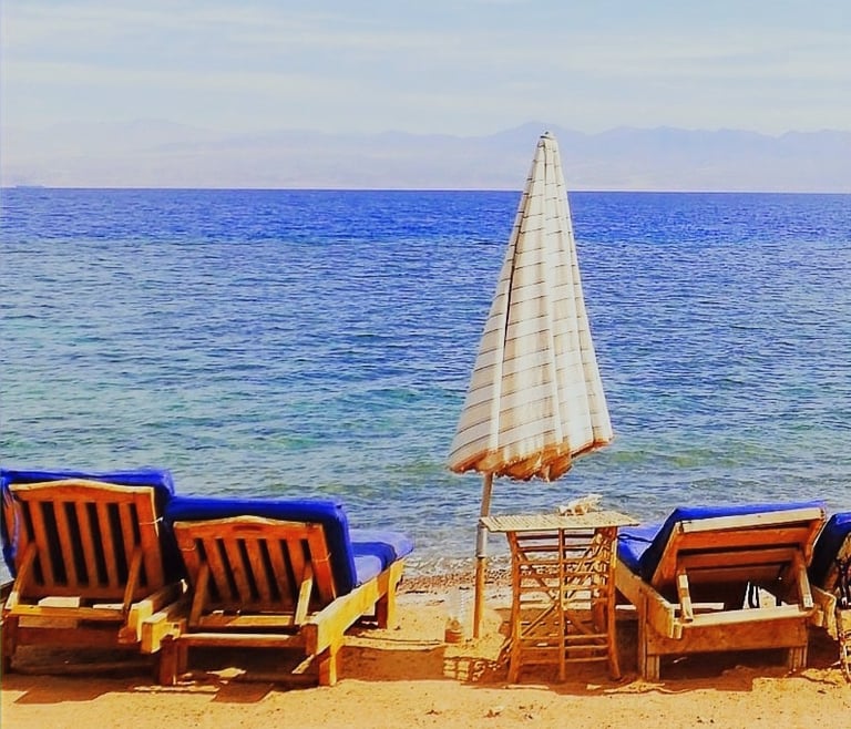 Relaxing in front of the sea on our chaise lounge