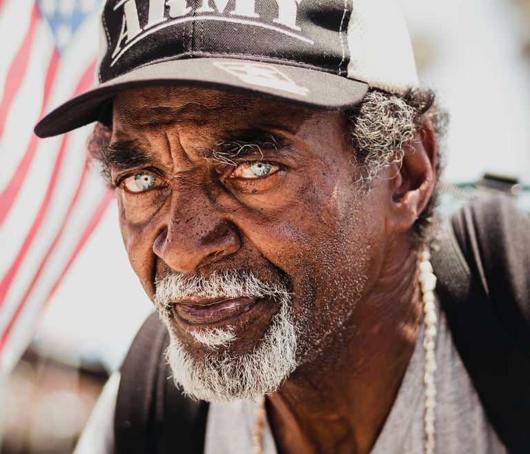 a man with an army hat on