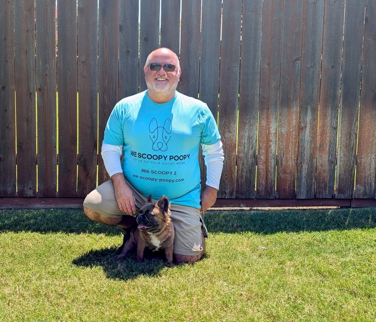 Man kneeling by a dog