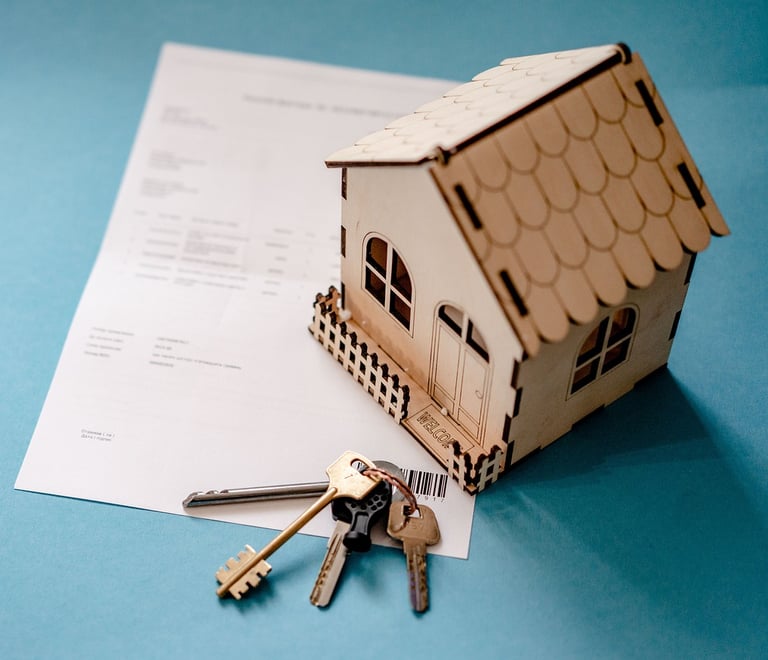 a house with keys and keys in front of a house