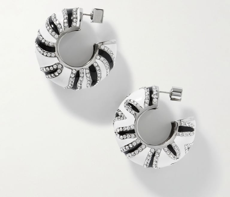 Luxury crystal-embellished hoop earrings with black and white enamel design.