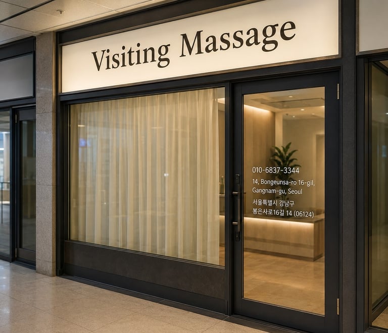 Visiting Massage storefront in Seoul with signage and contact information