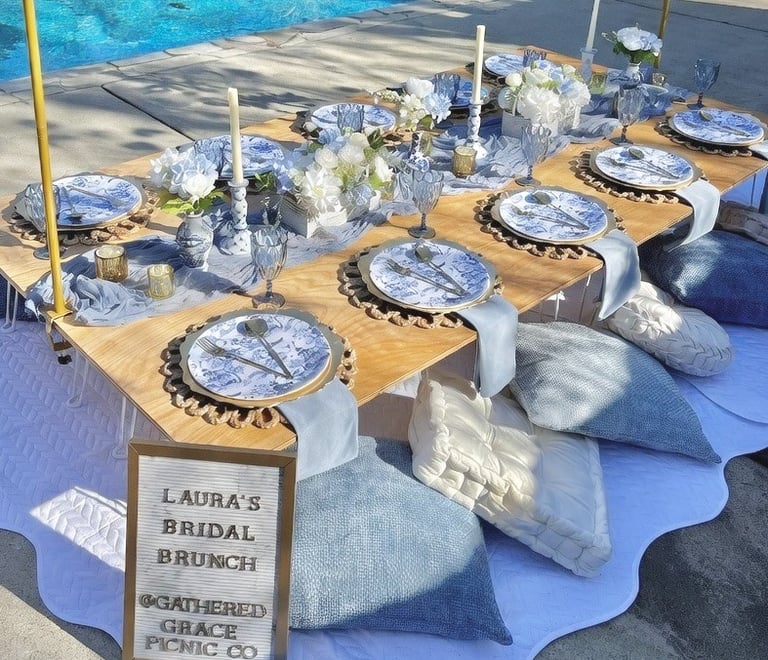 Gathered Grace Picnic Co luxury picnic by the pool Bridal Brunch Blue Willow theme Blue & White 