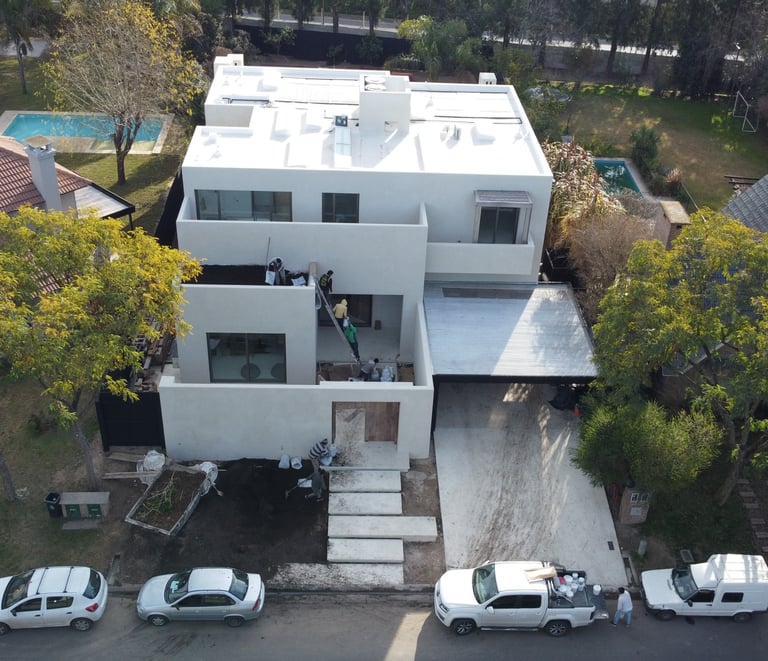 a house with a white truck parked in front of it