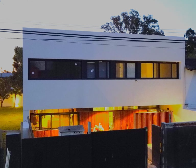 a house with a fire in the background