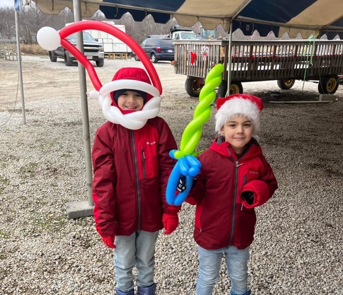 Kids posing with their balloons
