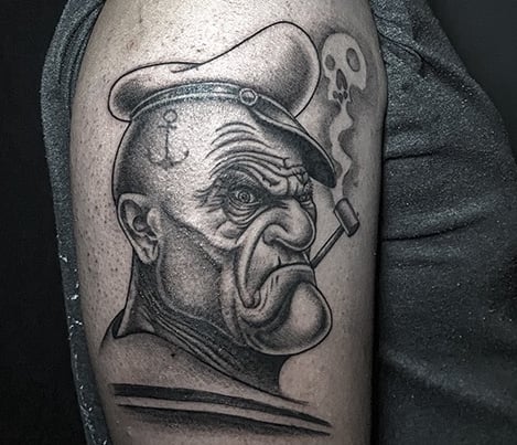 Tatouage d'un papaye badass.