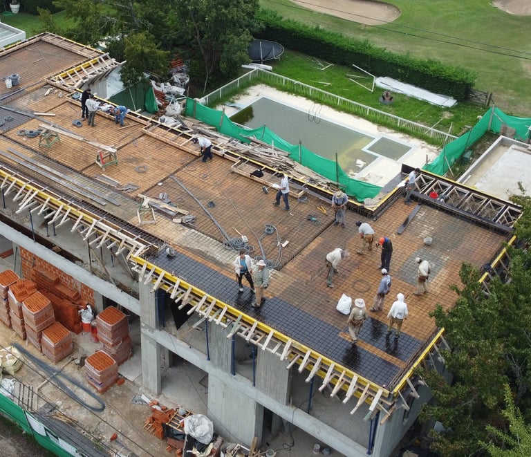 a group of people standing on top of a building