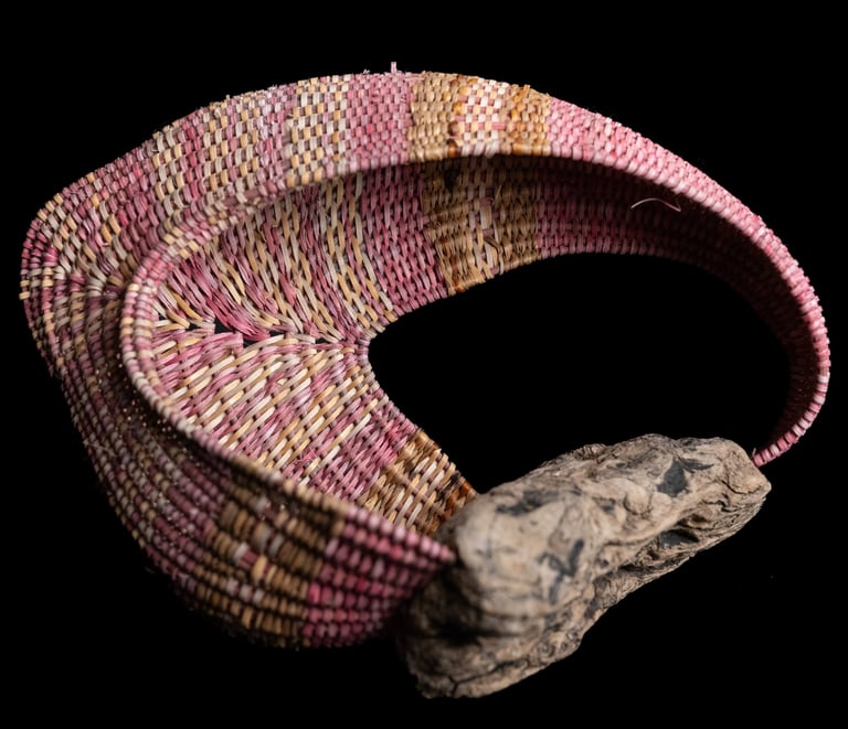 A Swim in a Pond in the Rain, 2025, cane, reed, sweetgrass,driftwood