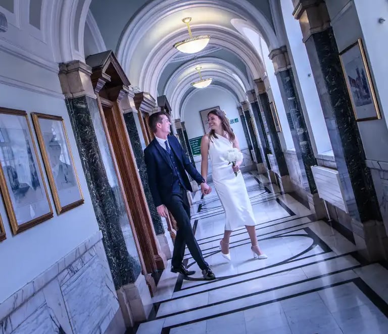 newly-weds leaving Islington Town Hall ceremony room