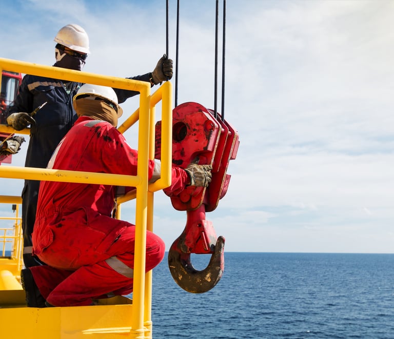SLA inspector inspecting offshore crane hook and sheaves being inspected