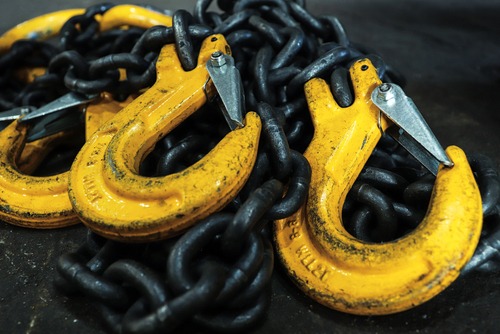 chain sling and hooks being inspected