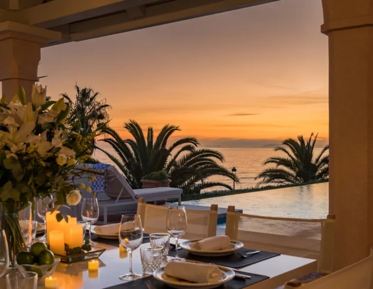 Sunset poolside dinner at Villa El Rincon with candles