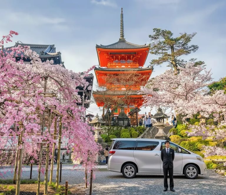 Private tour van with driver parked near Yasaka Pagoda in Kyoto.