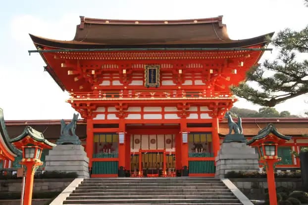 Main entrance to Fushimi Inari Shrine, easier to reach with a private driver.