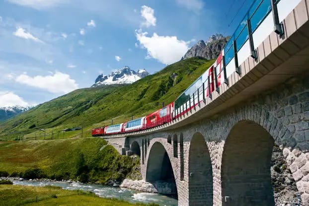 Scenic train ride on a viaduct in the Swiss Alps, included in the Swiss Travel Pass network