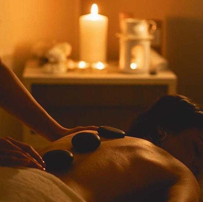 a man getting a massage at a spa