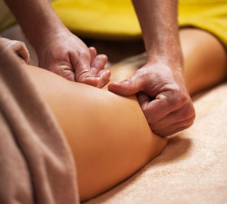 a person is getting a massage at a massage