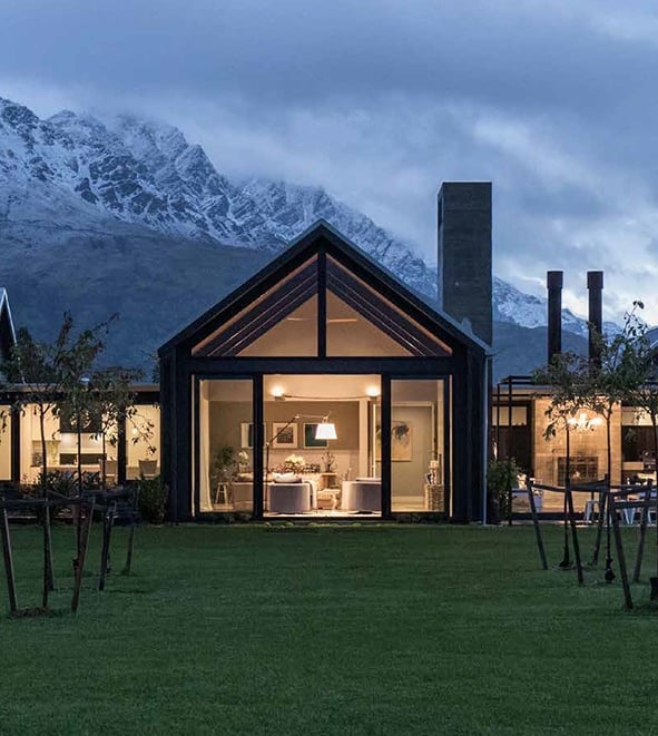 a house with a view of a mountain in the background