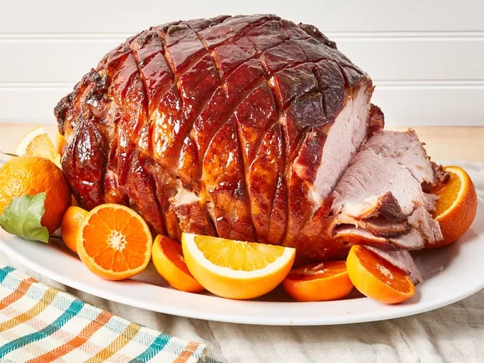 Glazzed honey ham for easter with orange slices