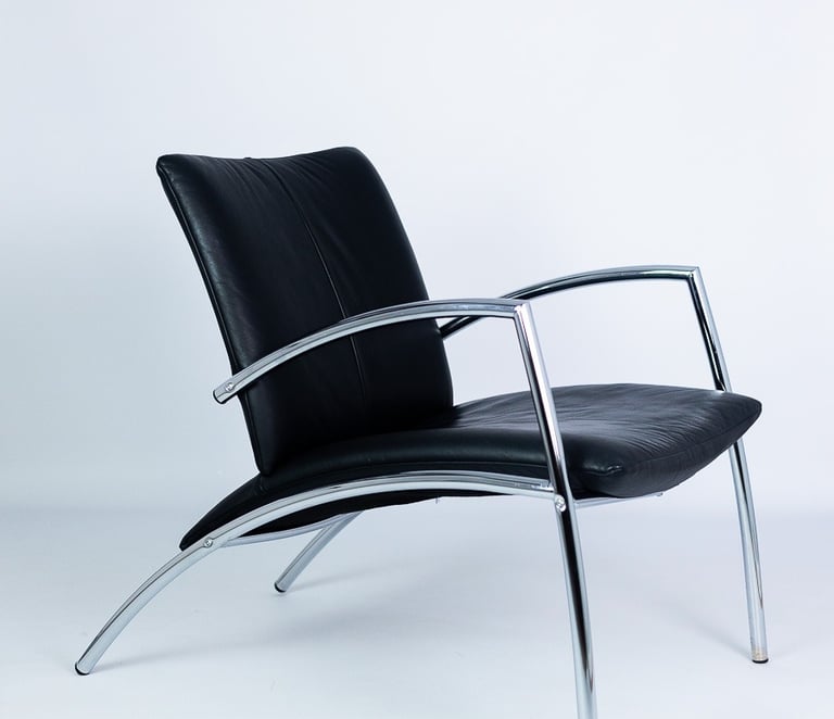 Modern black leather and steel lounge chair – designer chair