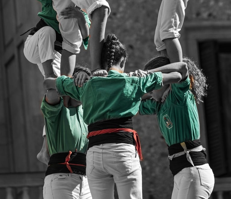 a group of people standing on top of a tower