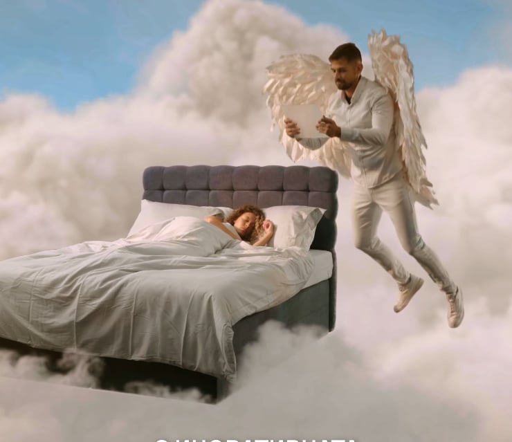 a man in a white suit is flying through the clouds