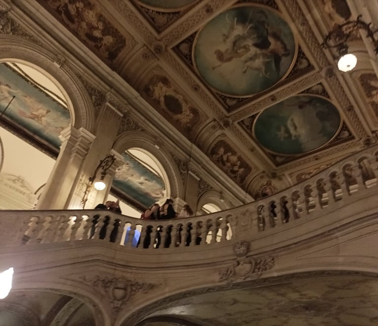 Sweeping staircases and ceiling frescoes