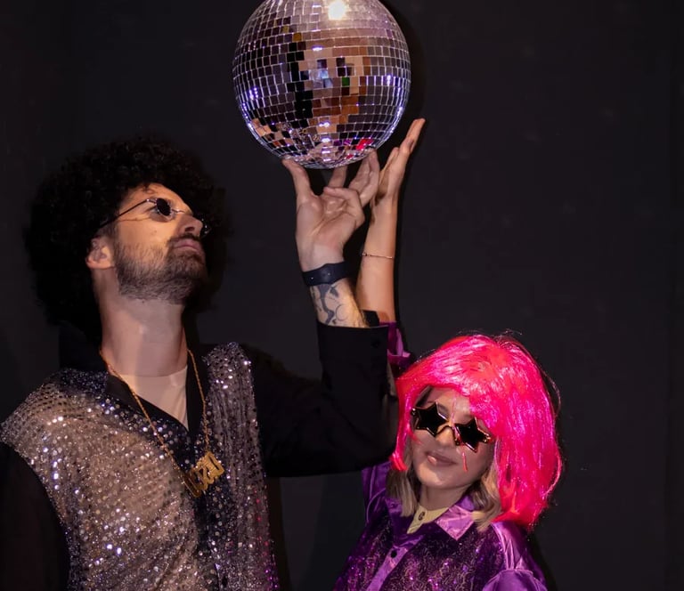 Tourists holding a disco ball in a neon-lit party room, a unique things to do in Split nightlife.