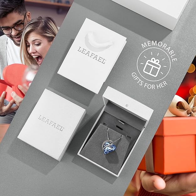 a couple of people holding a box of jewelry