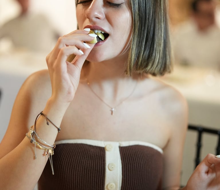 Guest enjoying artisan chocolate during a luxury chocolate tasting experience by DIBOC in Tampa