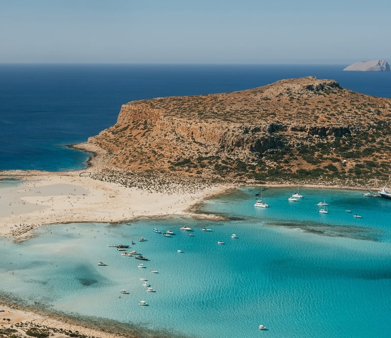 Balos Lagoon shallow turquoise water and white sandbars in a curved lagoon