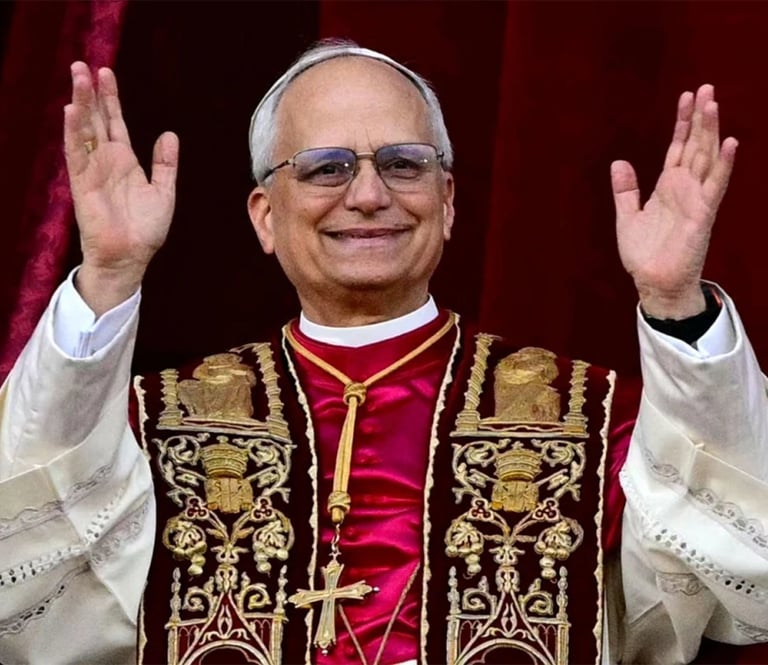Papa Leon XIV in a priest's robes and glasses