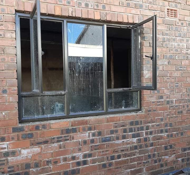 Bronze casement window installation in Bluff