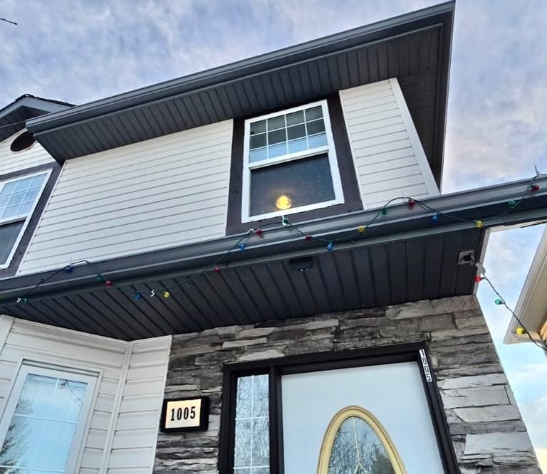 Professional seamless gutter installation in Country Hills NW Calgary.
