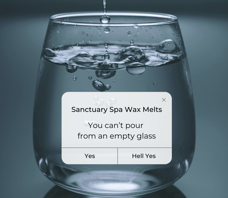 a glass of water with a message on it. Sanctuary Spa Wax Melts
