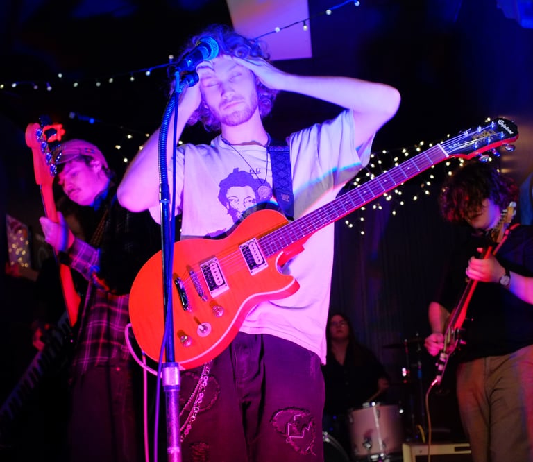 Event photography in Montgomery AL – Carmine Sun at Village Green Records, live concert photo by Spirit World Photo