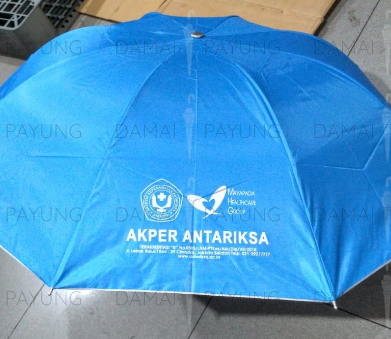 Payung promosi polos lipat warna lapis silver akper antariksa