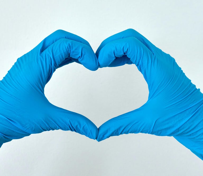 blue-gloved hands making a heart shape
