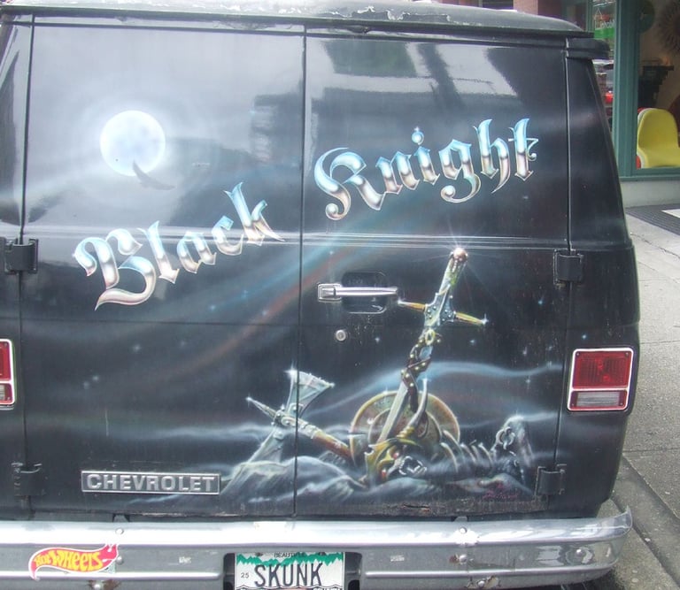 a van with a black and knight on the back