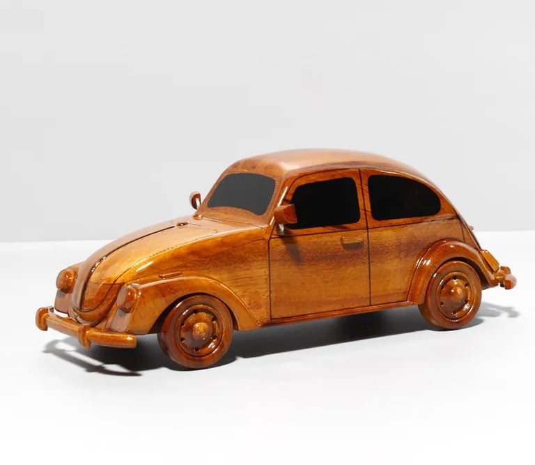 a wooden toy car with a wooden car in the background