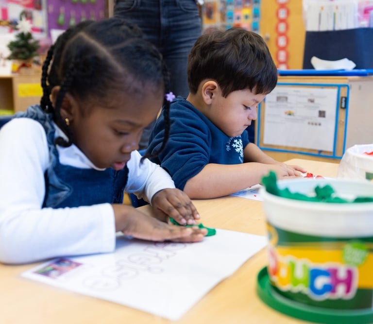 students work on oopa playdough mats