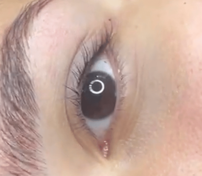 a woman with a piercings on her eye Sol Contreras