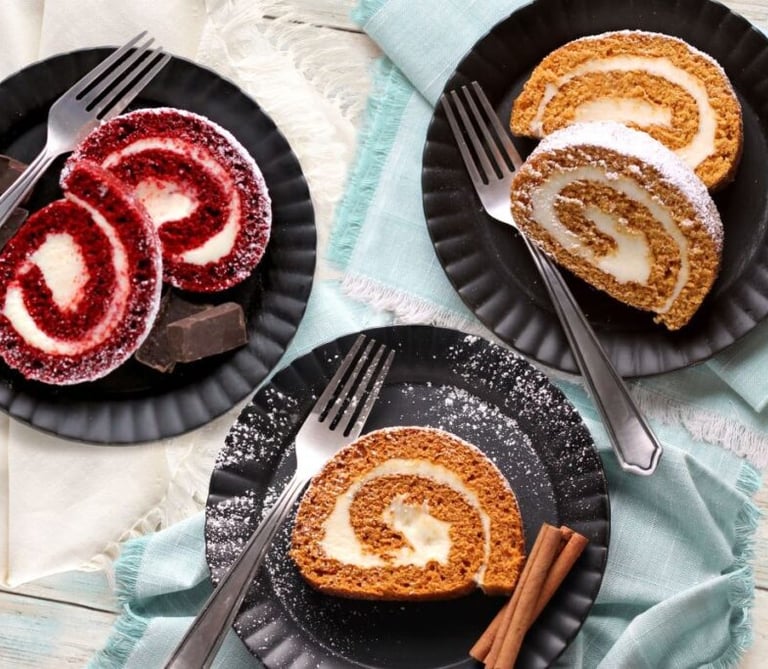 a plate of food and a fork and knife on a table