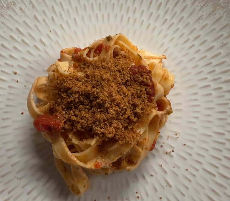 Tagliatelle with Arribbiata sauce ready to be enjoyed by class participants