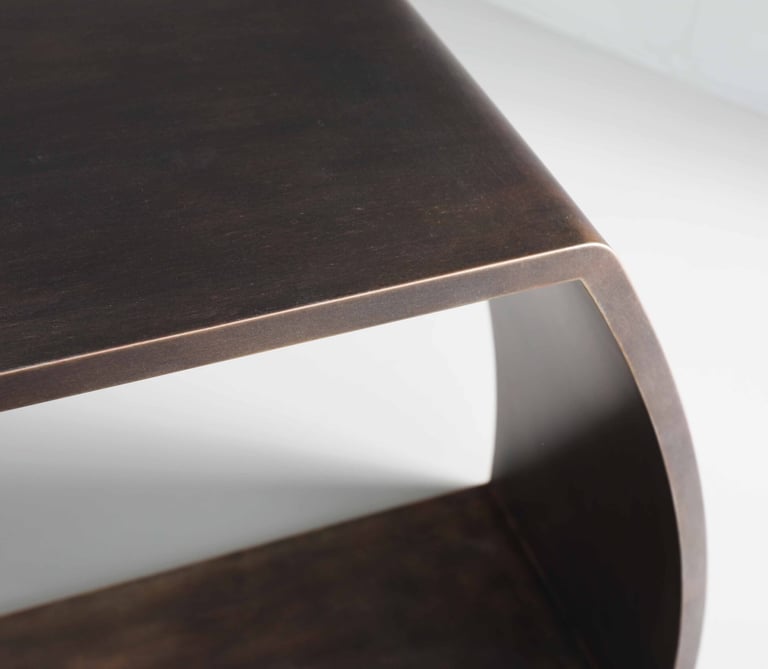 Close up of Bronze console table created by Tom Faulkner and designed by Amy Tsao