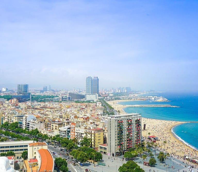 Barcelona city & beach from above during the day