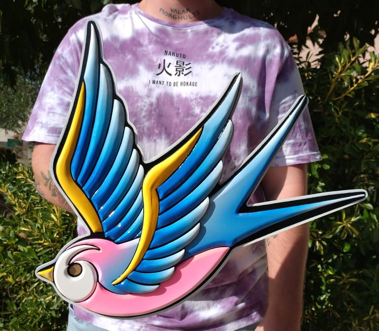 Hirondelle sculptée